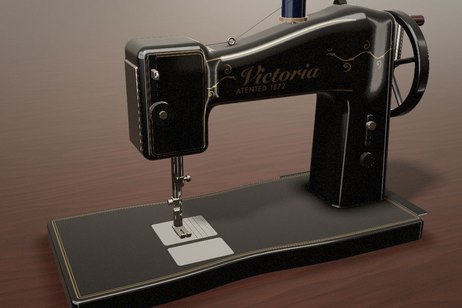 The Victoria, a black hand-crank machine with gold decals