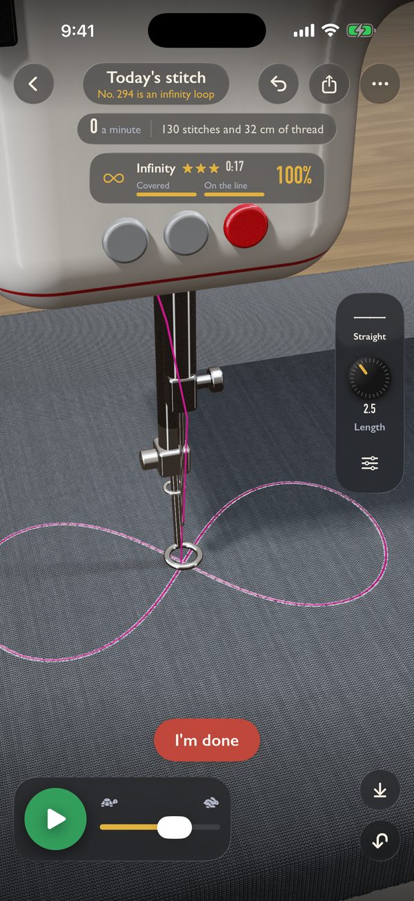 Today's stitch: an infinity loop chalked on denim and sewn over in pink thread, with a score of 100 percent.
